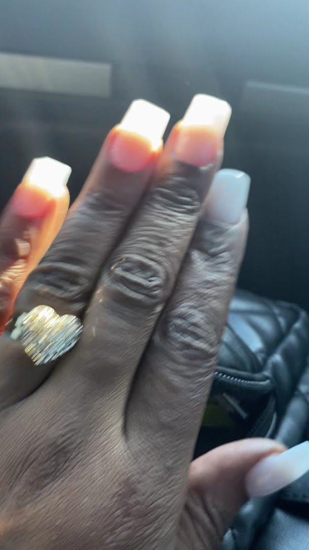 Polished nails displayed near salon tools